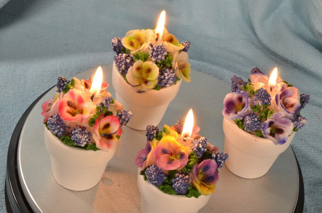 Set van 4 verschillende bloemenkaarsen
